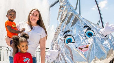 Hershey's Kiss Character at Hersheypark celebrating with happy children
