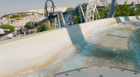 Wide shot view of the Coal Cracker about to slide down the drop.