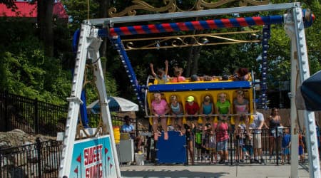 Children riding the Sweet Swing ride at Hersheypark