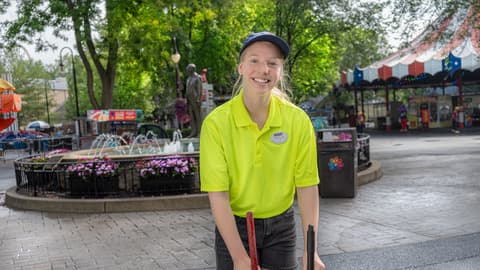 girl-sweeping-in-front-of-milton-hershey-statue-at-hersheypark.jpg
