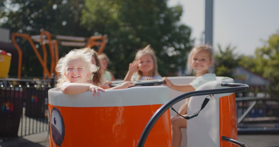 children riding mini scrambler at hersheypark