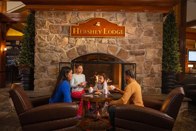 mom dad and kids fireplace hershey lodge