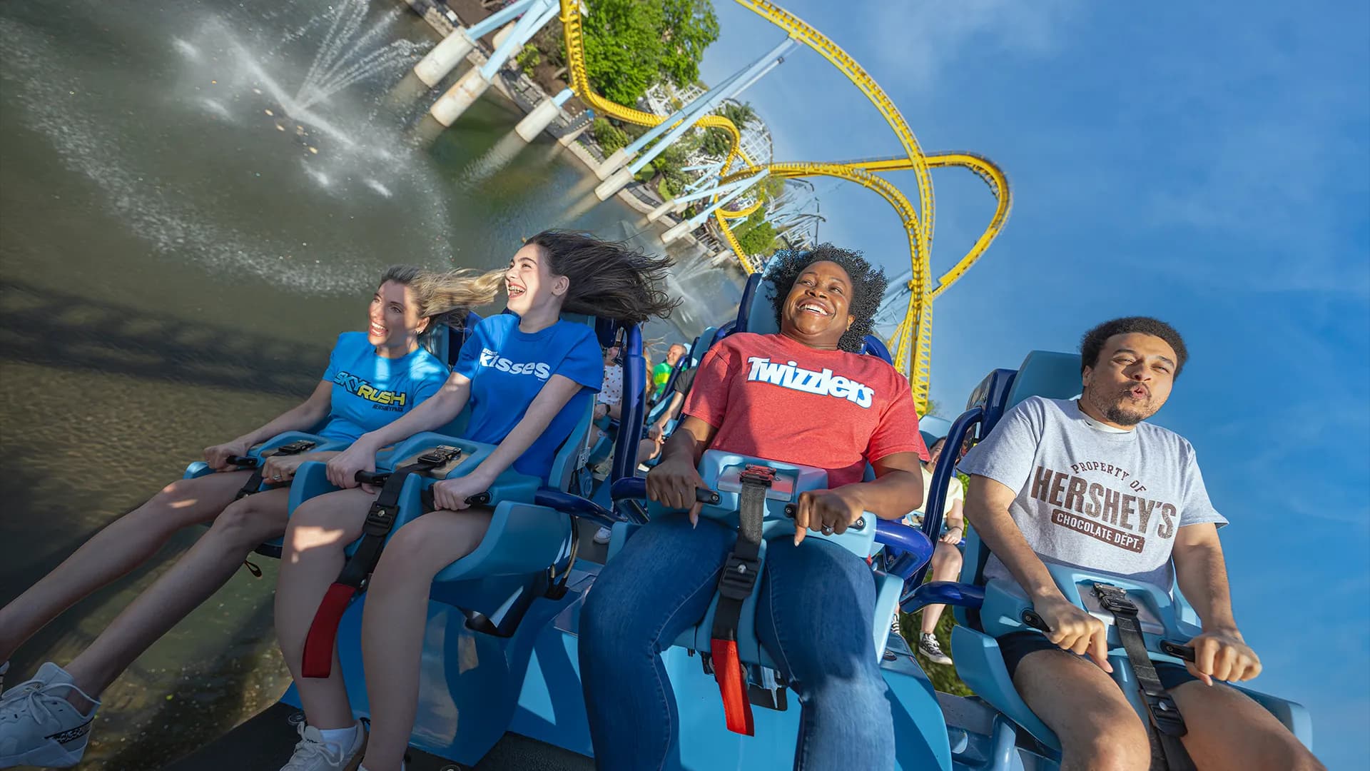 family riding skyrush at hersheypark over water photo